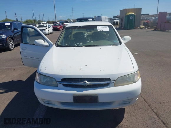 1999 Nissan Altima XE with VIN 1N4DL01D2XC125672, listed as a IAAI auction lot 41379153 with 183,685 mi miles. Bid and sale history available at carsss.com. Image 6.