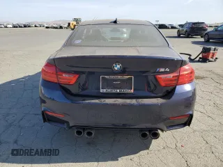 2015 BMW M4 with VIN WBS3R9C50FK335084, listed as a Copart auction lot 61962965 with 142,157 mi miles and Salvage title. Bid and sale history available at DreamBid. Image 6.