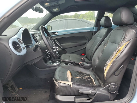 2012 Volkswagen Beetle 2.5L with VIN 3VWJX7AT3CM638565, listed as a Copart auction lot 51822625 with 214,341 mi miles and Salvage Title. Bid and sale history available at carsss.com. Image 7.