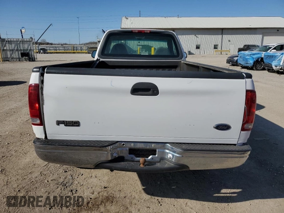 2000 Ford F-150 XL with VIN 1FTZF1825YKB19373, listed as a Copart auction lot 52078555 with 124,452 mi miles and Salvage title. Bid and sale history available at DreamBid. Image 6.