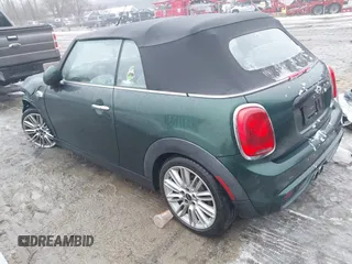 2017 MINI Convertible Cooper S z VIN WMWWG9C38H3C81071, wystawiony jako IAAI lot #41522738 z przebiegiem 59 040 mil mil oraz . Historia ofert i sprzedaży dostępna na DreamBid. Obrazek 3.