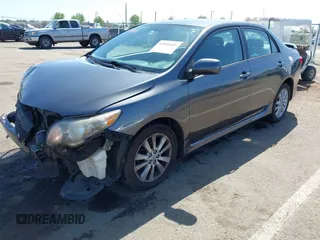 2009 Toyota Corolla with VIN 1NXBU40E69Z034459, listed as a IAAI auction lot 42095649 with 173,296 mi miles. Bid and sale history available at carsss.com. Image 17.