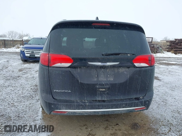 2018 Chrysler Pacifica Touring L Plus z VIN 2C4RC1EGXJR261251, wystawiony jako IAAI lot #41180745 z przebiegiem 82 548 mil mil oraz . Historia ofert i sprzedaży dostępna na DreamBid. Obrazek 16.