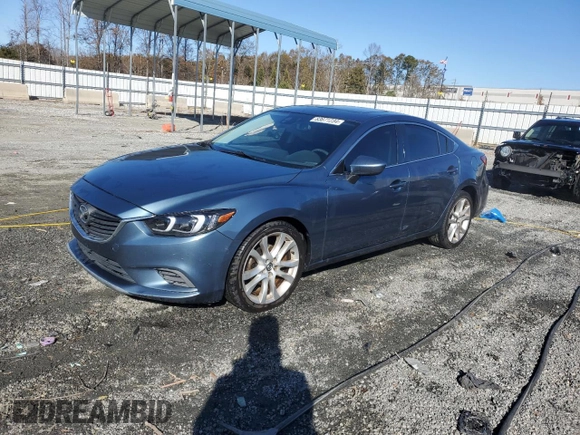 2014 Mazda Mazda6 i Touring with VIN JM1GJ1T55E1110567, listed as a Copart auction lot 83671234 with 143,824 mi miles and Salvage Title. Bid and sale history available at carsss.com. Image 1.