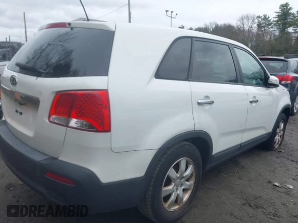 2012 Kia Sorento LX with VIN 5XYKT3A17CG215317, listed as a IAAI auction lot 42024912 with 221,149 mi miles. Bid and sale history available at carsss.com. Image 4.