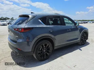 2024 Mazda CX-5 S Carbon Edition z VIN JM3KFBCL3R0481732, wystawiony jako Copart lot #56997135 z przebiegiem 32 887 mil mil oraz Tytuł czysty. Historia ofert i sprzedaży dostępna na DreamBid. Obrazek 3.