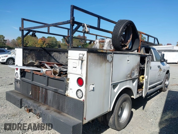 2018 Ram 3500 Tradesman with VIN 3C7WRSCL3JG165767, listed as a IAAI auction lot 40612945 with 1 mi miles. Bid and sale history available at carsss.com. Image 4.