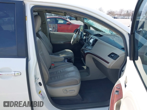 2011 Toyota Sienna XLE AAS with VIN 5TDYK3DC8BS085477, listed as a IAAI auction lot 41934541 with 131,768 mi miles and . Bid and sale history available at DreamBid. Image 5.