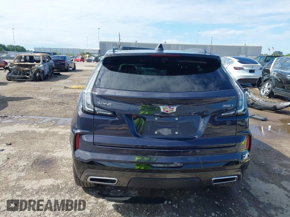 2024 Cadillac XT4 FWD Sport with VIN 1GYFZER40RF226384, listed as a IAAI auction lot 42220804 with 8,743 mi miles and . Bid and sale history available at DreamBid. Image 17.