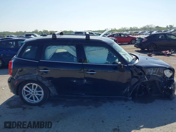 2015 MINI Countryman with VIN WMWZB3C54FWM33074, listed as a IAAI auction lot 42094992 with 86,704 mi miles and . Bid and sale history available at DreamBid. Image 14.