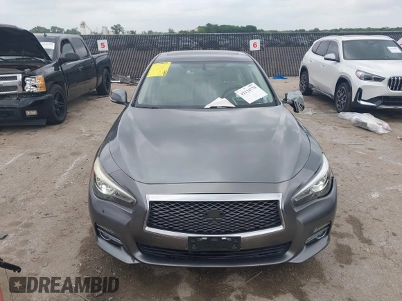 2015 Infiniti Q50 Premium z VIN JN1BV7AR9FM413801, wystawiony jako IAAI lot #42134770 z przebiegiem 111 367 mil mil oraz . Historia ofert i sprzedaży dostępna na DreamBid. Obrazek 12.