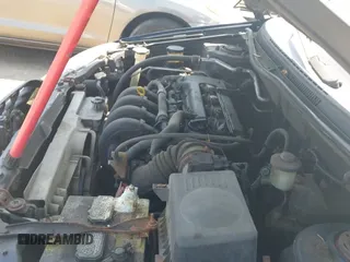 2003 Toyota Corolla LE z VIN JTDBR32E330033183, wystawiony jako IAAI lot #42861267 z przebiegiem 241 906 mil mil oraz . Historia ofert i sprzedaży dostępna na DreamBid. Obrazek 12.