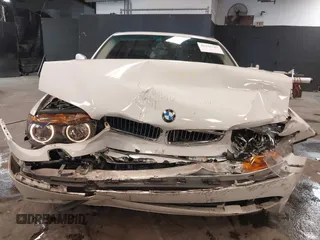 2003 BMW 7 Series 745Li with VIN WBAGN63463DR08268, listed as a IAAI auction lot 41355287 with 210,333 mi miles and . Bid and sale history available at DreamBid. Image 6.