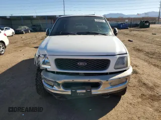 1998 Ford F-150 with VIN 1FTZX18W3WNA25682, listed as a Copart auction lot 47494755 with 197,389 mi miles and Salvage title. Bid and sale history available at DreamBid. Image 5.
