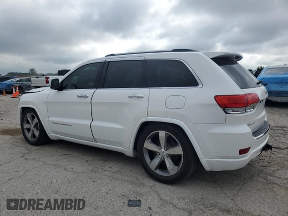 2016 Jeep Grand Cherokee Overland z VIN 1C4RJFCG1GC377512, wystawiony jako Copart lot #62996785 z przebiegiem 160 718 mil mil oraz Szkoda całkowita • Salvage title. Historia ofert i sprzedaży dostępna na DreamBid. Obrazek 2.
