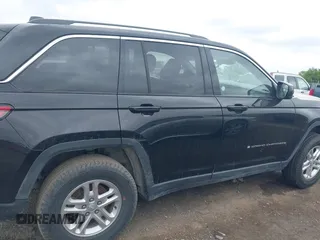 2023 Jeep Grand Cherokee Laredo with VIN 1C4RJHAG0PC640619, listed as a IAAI auction lot 42351031 with 53,507 mi miles and . Bid and sale history available at DreamBid. Image 13.