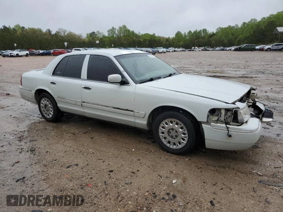 2003 Mercury Grand Marquis GS Convenience z VIN 2MEFM74W53X702387, wystawiony jako Copart lot #52852475 z przebiegiem 246 543 mil mil oraz Szkoda całkowita • Salvage title. Historia ofert i sprzedaży dostępna na DreamBid. Obrazek 4.