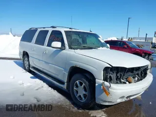 2003 GMC Yukon XL Denali with VIN 1GKFK66U03J295895, listed as a IAAI auction lot 41720019 with 233,965 mi miles. Bid and sale history available at carsss.com. Image 1.
