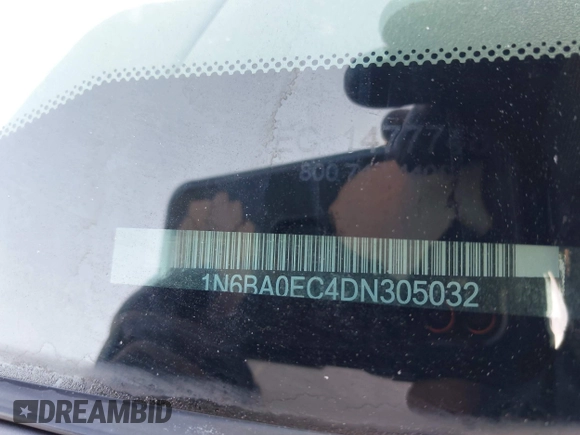 2013 Nissan Titan Pro-4X with VIN 1N6BA0EC4DN305032, listed as a IAAI auction lot 42341681 with 118,251 mi miles and . Bid and sale history available at DreamBid. Image 9.