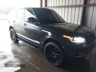 2014 Land Rover Range Rover HSE with VIN SALGS2WF0EA136283, listed as a IAAI auction lot 42161616 with 135,133 mi miles and . Bid and sale history available at DreamBid. Image 1.