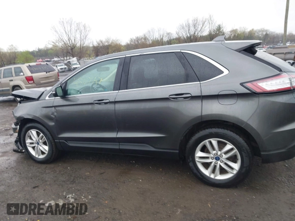 2016 Ford Edge SEL z VIN 2FMPK4J87GBC61845, wystawiony jako IAAI lot #42017547 z przebiegiem 90 710 mil mil oraz . Historia ofert i sprzedaży dostępna na DreamBid. Obrazek 14.