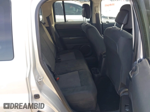 2012 Jeep Patriot Sport with VIN 1C4NJPBA4CD554141, listed as a IAAI auction lot 42119535 with 116,933 mi miles and . Bid and sale history available at DreamBid. Image 8.