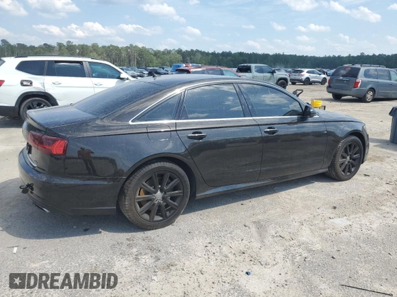 2016 Audi A6 Premium Plus with VIN WAUGFAFC0GN009716, listed as a Copart auction lot 56692645 with 82,189 mi miles and Salvage title. Bid and sale history available at DreamBid. Image 3.