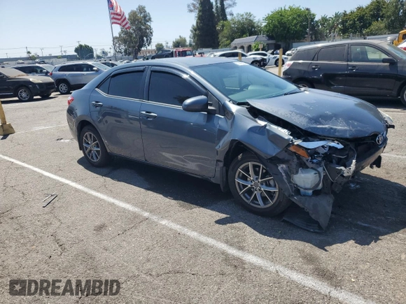 2014 Toyota Corolla L with VIN 5YFBURHE5EP014071, listed as a Copart auction lot 61442695 with 140,944 mi miles and Salvage title. Bid and sale history available at DreamBid. Image 4.