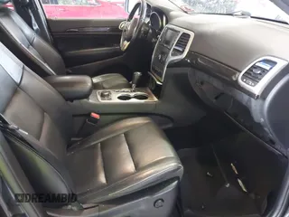2012 Jeep Grand Cherokee Laredo with VIN 1C4RJFAT8CC182128, listed as a IAAI auction lot 40154044 with 239,601 mi miles. Bid and sale history available at carsss.com. Image 5.