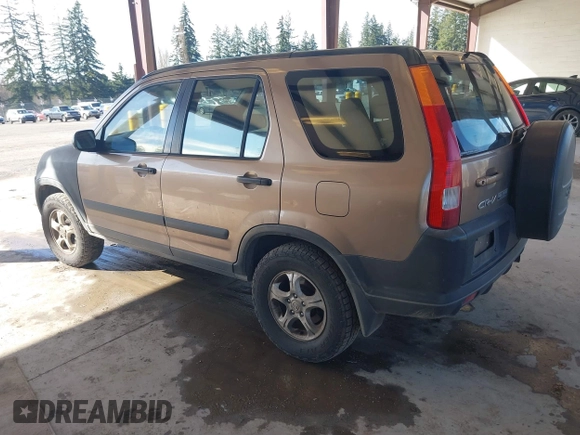 2002 Honda CR-V LX z VIN JHLRD78512C007757, wystawiony jako IAAI lot #41885302 z przebiegiem 177 892 mil mil oraz . Historia ofert i sprzedaży dostępna na DreamBid. Obrazek 3.