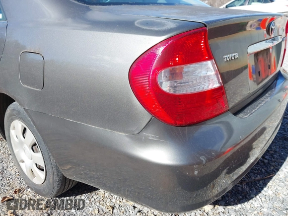 2004 Toyota Camry LE with VIN 4T1BE32K54U904138, listed as a IAAI auction lot 41792208 with 217,829 mi miles and . Bid and sale history available at carsss.com. Image 14.