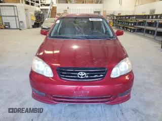 2003 Toyota Corolla CE with VIN 1NXBR32E63Z161048, listed as a Copart auction lot 83226694 with 299,999 mi miles and Salvage Title. Bid and sale history available at carsss.com. Image 5.