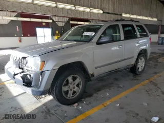 2007 Jeep Grand Cherokee Laredo with VIN 1J8GR48K67C652382, listed as a Copart auction lot 45310295 with 266,618 mi miles and Salvage Title. Bid and sale history available at carsss.com. Image 1.