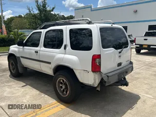 2003 Nissan Xterra SE with VIN 5N1ED28T33C685064, listed as a Copart auction lot 60668505 with 227,211 mi miles and Clean title. Bid and sale history available at DreamBid. Image 3.