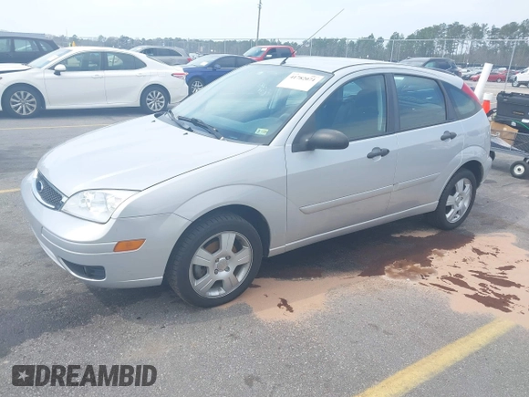 2007 Ford Focus S with VIN 1FAHP37N67W268162, listed as a IAAI auction lot 41782071 with 71,490 mi miles and . Bid and sale history available at carsss.com. Image 2.