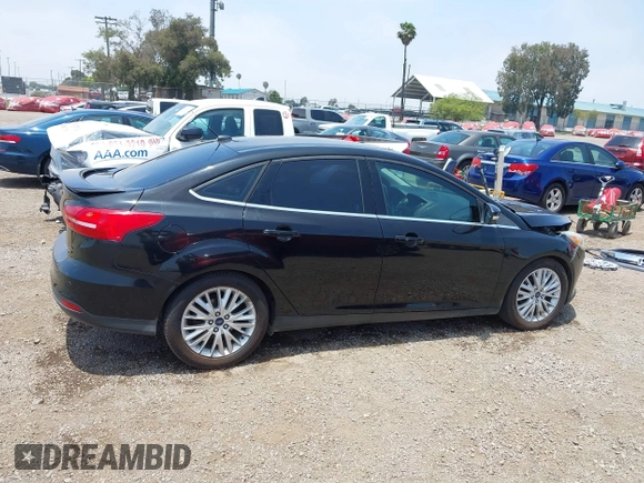 2016 Ford Focus Titanium z VIN 1FADP3J20GL310467, wystawiony jako IAAI lot #42478332 z przebiegiem 214 479 mil mil oraz . Historia ofert i sprzedaży dostępna na DreamBid. Obrazek 13.