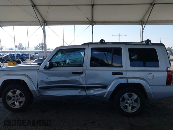2006 Jeep Commander z VIN 1J8HH48K76C329934, wystawiony jako IAAI lot #41528939 z przebiegiem 180 006 mil mil oraz . Historia ofert i sprzedaży dostępna na DreamBid. Obrazek 14.