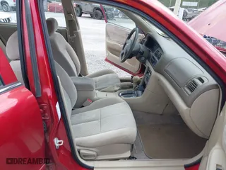 2000 Mazda 626 LX with VIN 1YVGF22C8Y5115891, listed as a IAAI auction lot 42121137 with 186,165 mi miles. Bid and sale history available at carsss.com. Image 5.