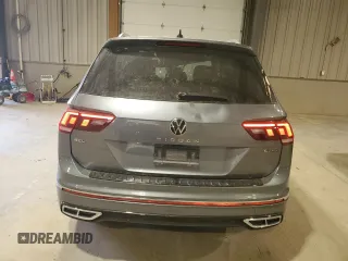 2023 Volkswagen Tiguan SEL R-Line with VIN 3VV4B7AX3PM072402, listed as a Copart auction lot 56656515 with 13,686 mi miles and Salvage title. Bid and sale history available at DreamBid. Image 6.