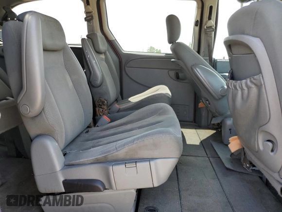 2007 Dodge Grand Caravan SE with VIN 1D4GP24R17B233725, listed as a Copart auction lot 58557245 with 306,473 mi miles and Salvage title. Bid and sale history available at DreamBid. Image 11.