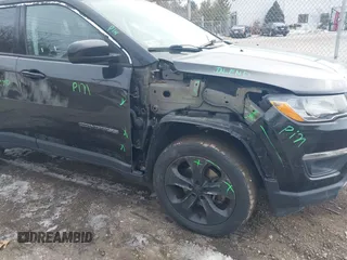 2018 Jeep Compass Altitude with VIN 3C4NJDBB1JT132052, listed as a IAAI auction lot 41622700 with 99,534 mi miles and . Bid and sale history available at carsss.com. Image 6.