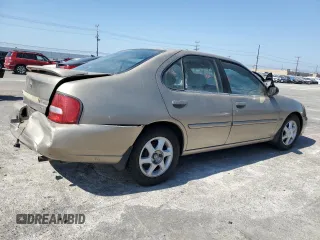 2001 Nissan Altima GXE with VIN 1N4DL01D51C242850, listed as a Copart auction lot 73544874 with 157,805 mi miles and Salvage Title. Bid and sale history available at carsss.com. Image 3.