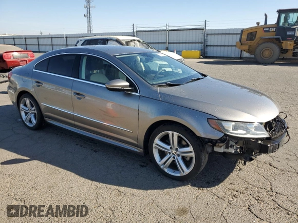 2013 Volkswagen CC R-Line with VIN WVWBP7AN2DE556410, listed as a Copart auction lot 77360244 with 114,891 mi miles and Salvage Title. Bid and sale history available at DreamBid. Image 4.