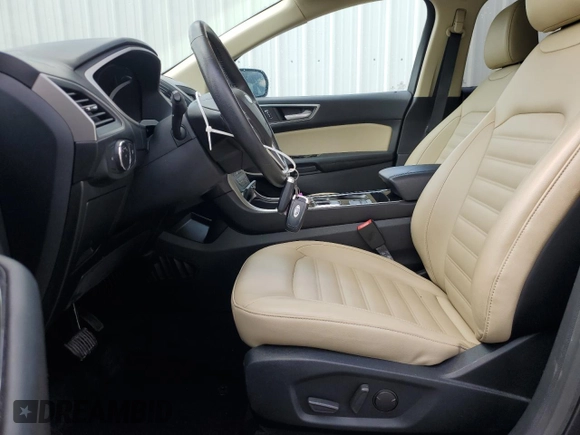 2020 Ford Edge SEL с VIN 2FMPK4J95LBB17293, выставлен на аукционе Copart как лот 58796255 с пробегом 82 583 миль миль и Чистый • Clean title. История ставок и продаж доступна на DreamBid. Изображение 7.