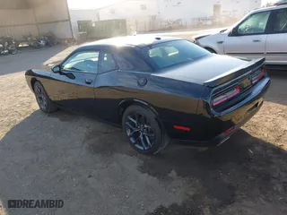 2023 Dodge Challenger SXT with VIN 2C3CDZAG0PH597128, listed as a IAAI auction lot 40865123 with 9,362 mi miles. Bid and sale history available at carsss.com. Image 3.