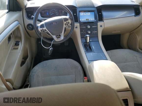 2016 Ford Taurus SEL with VIN 1FAHP2H89GG122884, listed as a Copart auction lot 53597595 with 128,627 mi miles and Salvage title. Bid and sale history available at DreamBid. Image 8.
