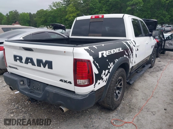 2017 Ram 1500 Rebel with VIN 1C6RR7YT7HS575529, listed as a IAAI auction lot 42125529 with 110,722 mi miles and . Bid and sale history available at DreamBid. Image 4.