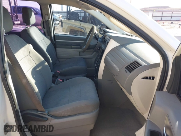 2010 Dodge Grand Caravan SE with VIN 2D4RN4DE8AR402655, listed as a IAAI auction lot 41883296 with 245,961 mi miles and . Bid and sale history available at DreamBid. Image 5.