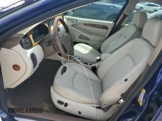 2004 Jaguar X-Type with VIN SAJEA51C44WD83361, listed as a Copart auction lot 55643545 with 54,615 mi miles and Salvage Title. Bid and sale history available at DreamBid. Image 7.