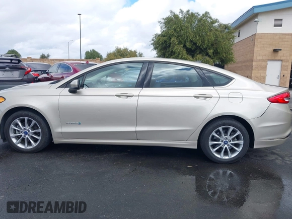2017 Ford Fusion Hybrid SE with VIN 3FA6P0LU0HR355269, listed as a IAAI auction lot 41745299 with 97,675 mi miles and . Bid and sale history available at DreamBid. Image 14.